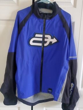 ARCTIVA POWERSPORTS SHELL JACKET XL. MENS BLUE BLACK.
